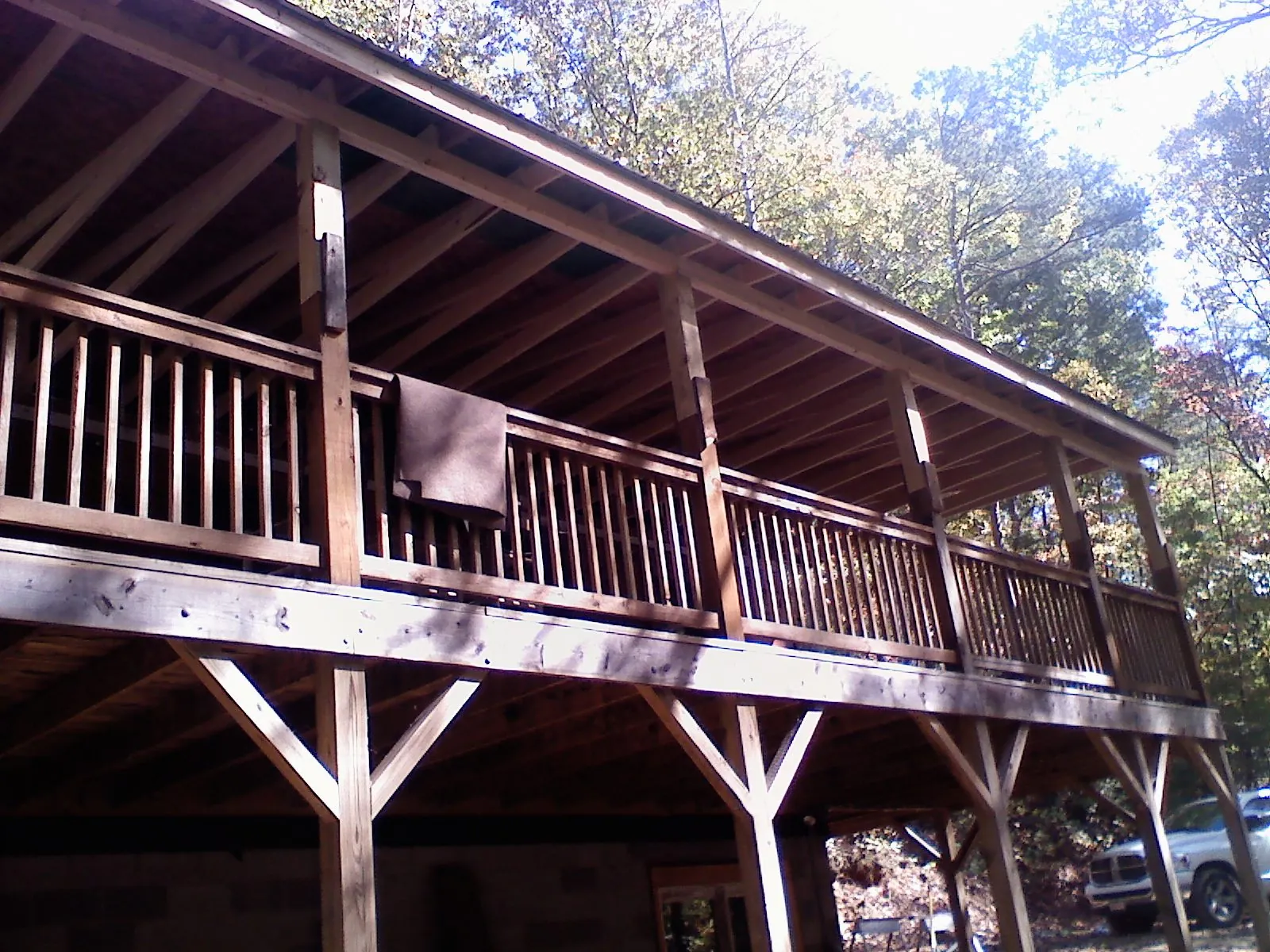 Timber framing under a new elevated porch and deck — Roof Leak Repair in Keller by Roofing Brothers